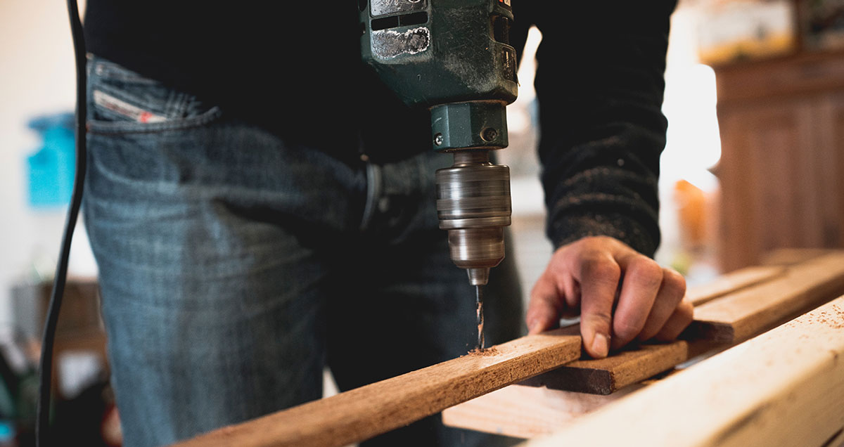 Man drilling wood